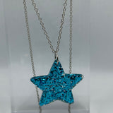 Lots of colours , Glitter star necklace, pendant on a gold or silver chain. 18 inches