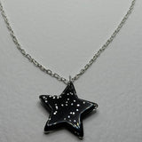 Lots of colours , Glitter star necklace, pendant on a gold or silver chain. 18 inches