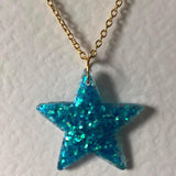 Lots of colours , Glitter star necklace, pendant on a gold or silver chain. 18 inches