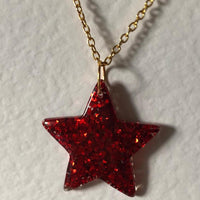 Lots of colours , Glitter star necklace, pendant on a gold or silver chain. 18 inches