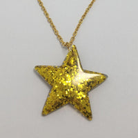 Lots of colours , Glitter star necklace, pendant on a gold or silver chain. 18 inches