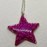 Lots of colours , Glitter star necklace, pendant on a gold or silver chain. 18 inches