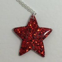 Lots of colours , Glitter star necklace, pendant on a gold or silver chain. 18 inches