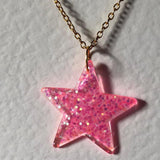 Lots of colours , Glitter star necklace, pendant on a gold or silver chain. 18 inches