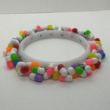 Encrusted Kitsch happy pill bangle bracelet. Rainbow bangle 2.6 inches diameter. Womens bangle